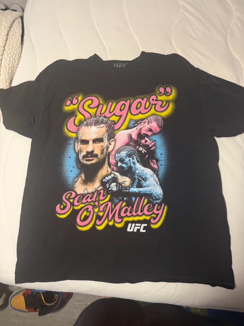UFC Black 'Sugar' Sean O'Malley Graphic Tee with Pink and Yellow Print